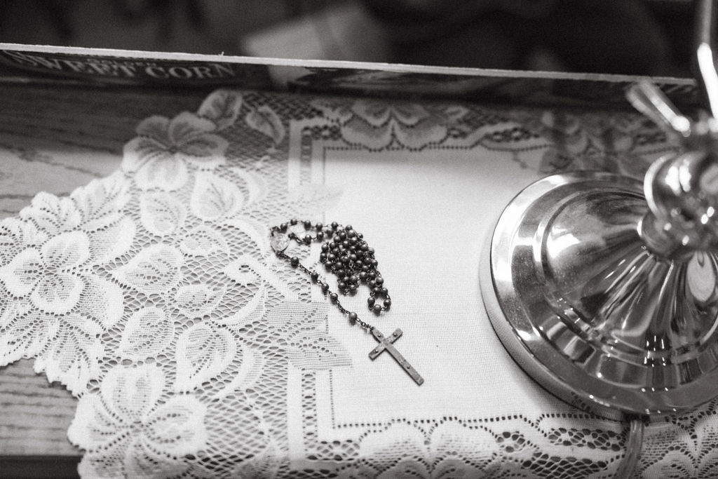 rosary sitting on piano